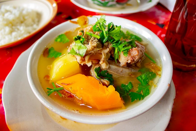 Photo sop buntut or oxtail soup or tail soup is traditional soup made from tail ox boiled with spices