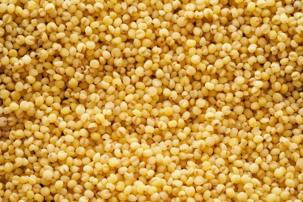 sorghum of sorghumkorrel, gierstkorrel of gierstzaadtextuurachtergrond