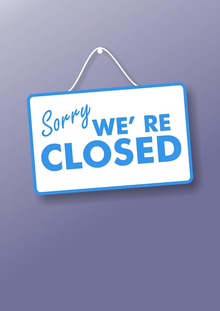 Photo sorry we are closed sign on blue background