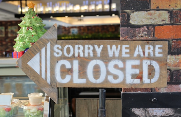 Sorry wij zijn gesloten teken op pijl houten bord