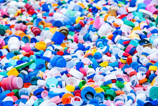 Sorting impressive amount of bottle plastic caps of different colors