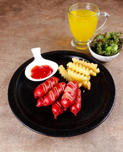 Sosis bakar Grilled sausage with sauce and side dish