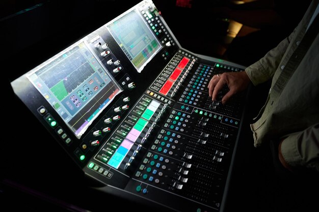 Photo sound mixer in work at a concert