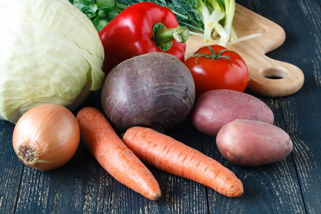 Soup kitchen ingredients on wooden table