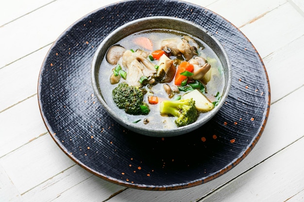 Soup with broccoli and mushrooms