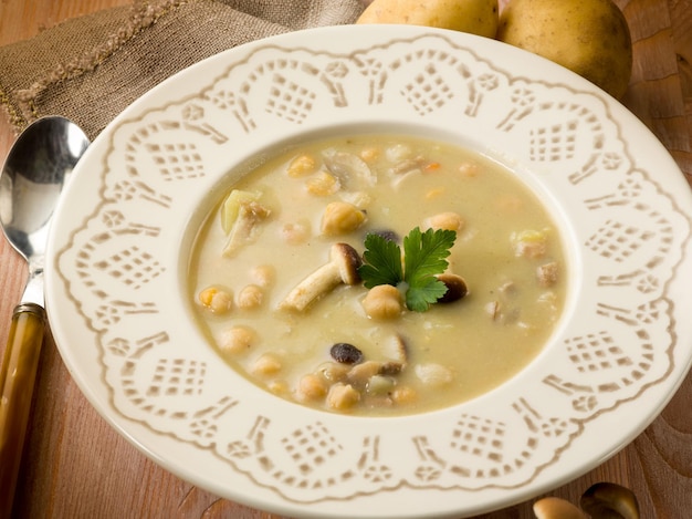 Soup with chickpeas mushroom and potatoes vegetarian food