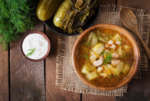 Soup with pickled cucumbers and beans in Ukrainian style