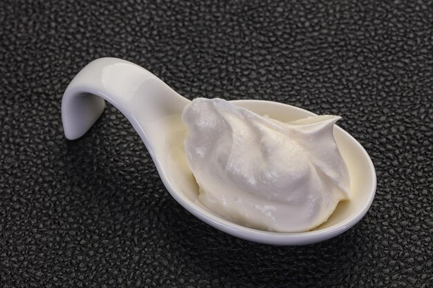 Photo sour cream in the bowl