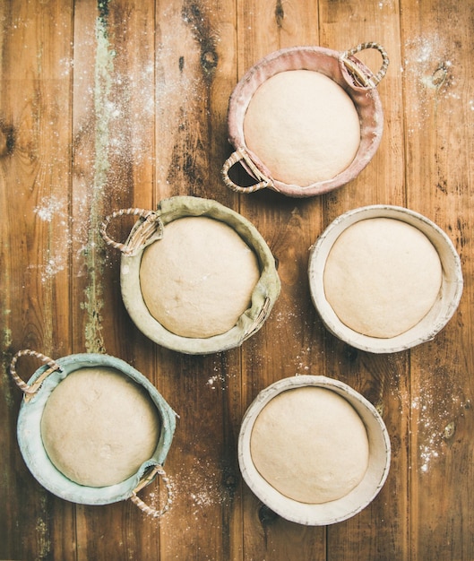 Sourdough for baking homemade bread in baskets copy space