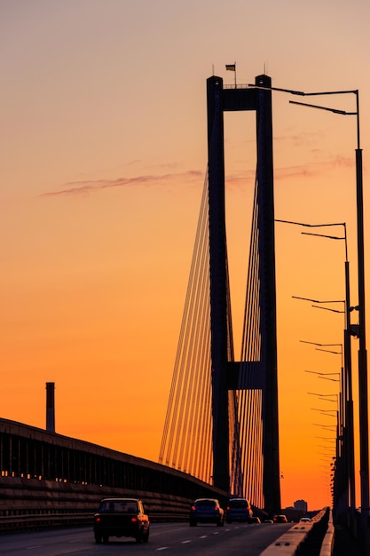 South bridge across the Dnieper river in Kiev Ukraine at sunset