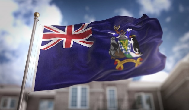 South Georgia and the South Sandwich Islands Flag 3D Rendering on Blue Sky Building Background 