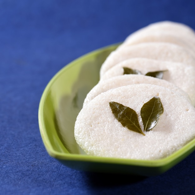 South indian cuisine vegetarian breakfast rava idli or idly in a plate.