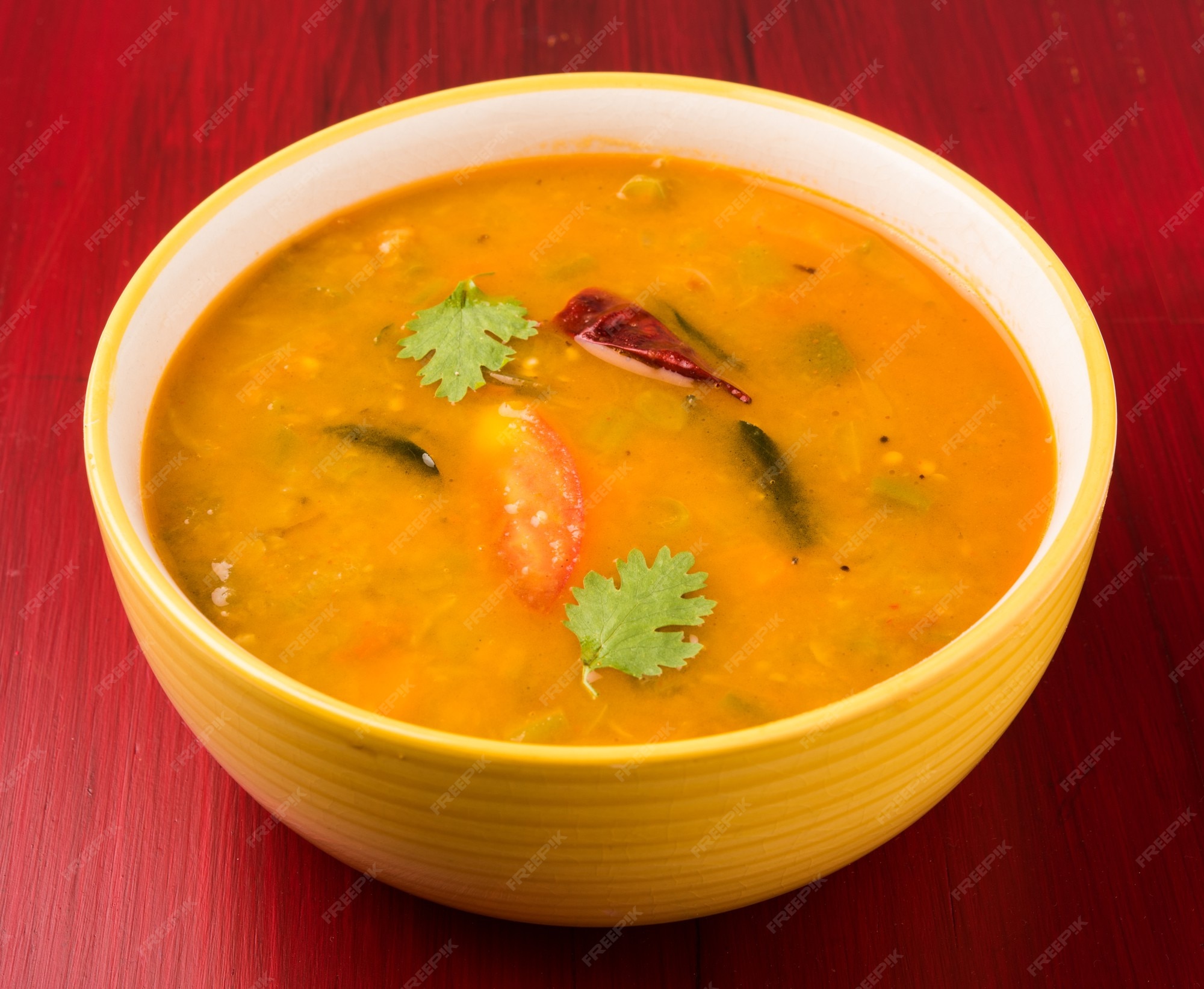 Premium Photo | South indian vegetable sambar, with vegetables and