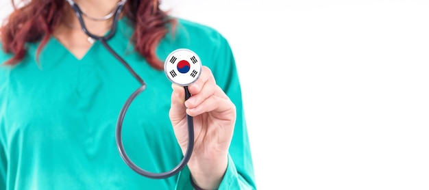 South Korea national healthcare system female doctor with stethoscope