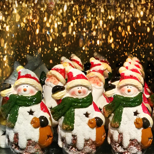 Souvenir snowmen in the store Christmas decorations for sale Happy New Year background