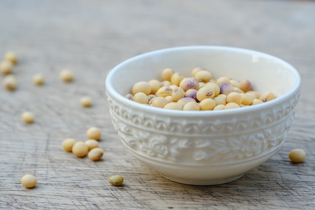 Soy bean in bowl on  wooden floor