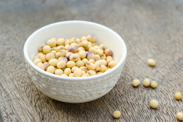 Soy bean in bowl on  wooden floor