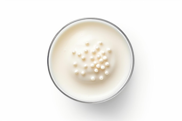 Photo soy milk bubble foam in a cup a refreshing delight on a white canvas top view