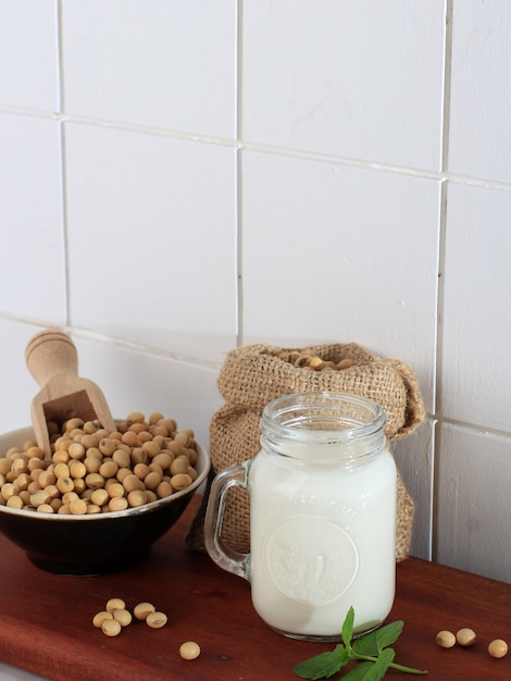 Soy Milk in Drink Jar and Soy Bean in A Bowl. Healthy Concept for non Dairy Milk