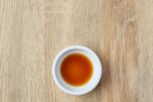 Soy sauce on wooden