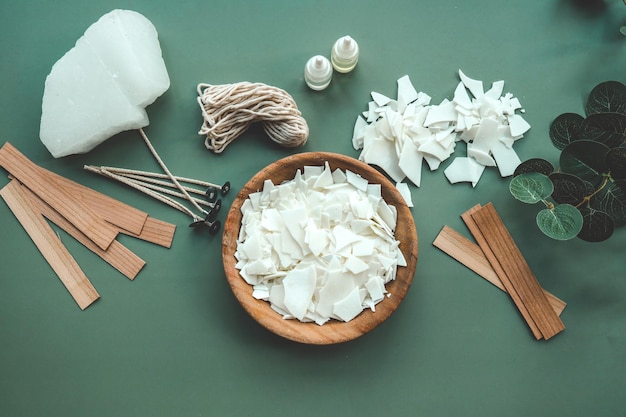 Soy wax candle wooden wicks and eucalyptus flat lay top view