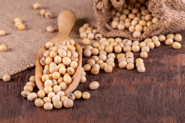 Soybean oil on a wooden background. rustic style