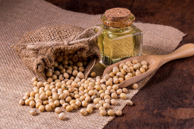 Soybean oil on a wooden background rustic style