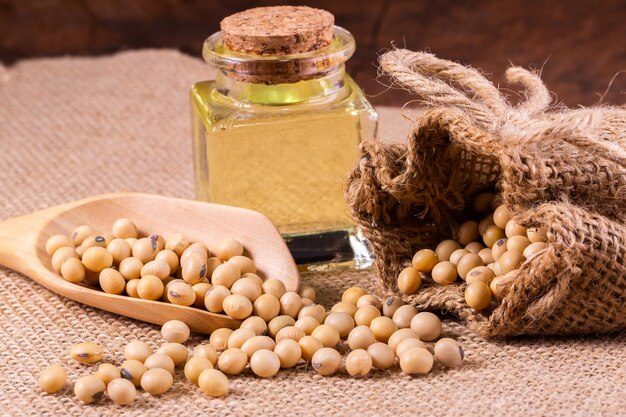 Soybean oil on a wooden background rustic style