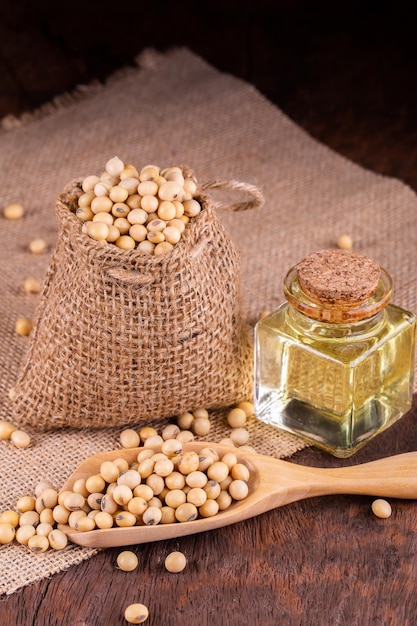 Soybean oil on a wooden background rustic style