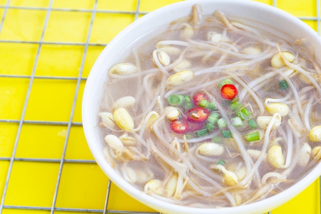 Soybean sprouts soup in white bowl