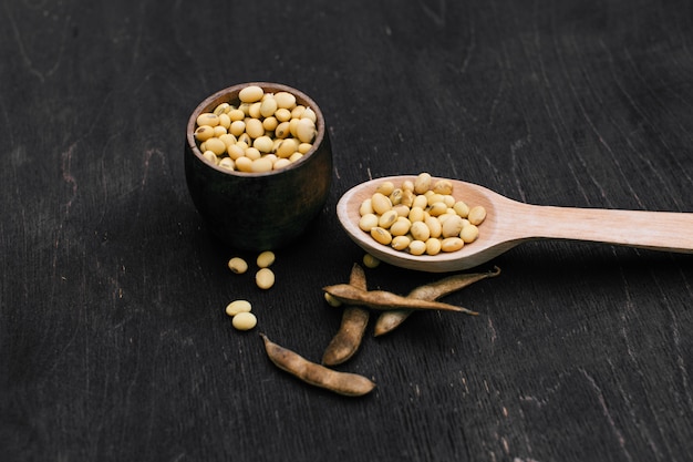 Soybeans pod, harvest of soy beans. Soybeans on wood. rustic style