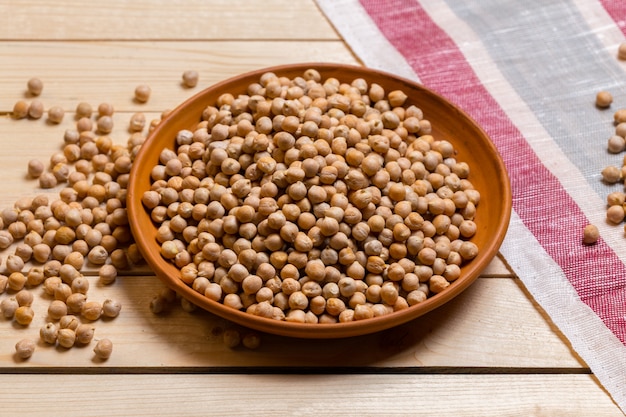 Soybeans over wooden table