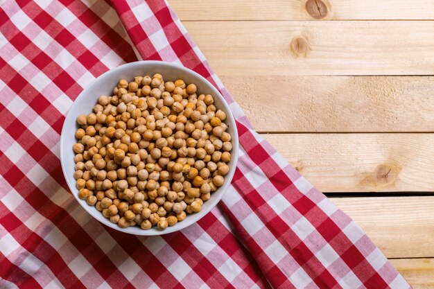 Soybeans over wooden table