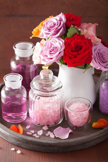 Spa aromatherapy with rose flowers, essential oils and salt