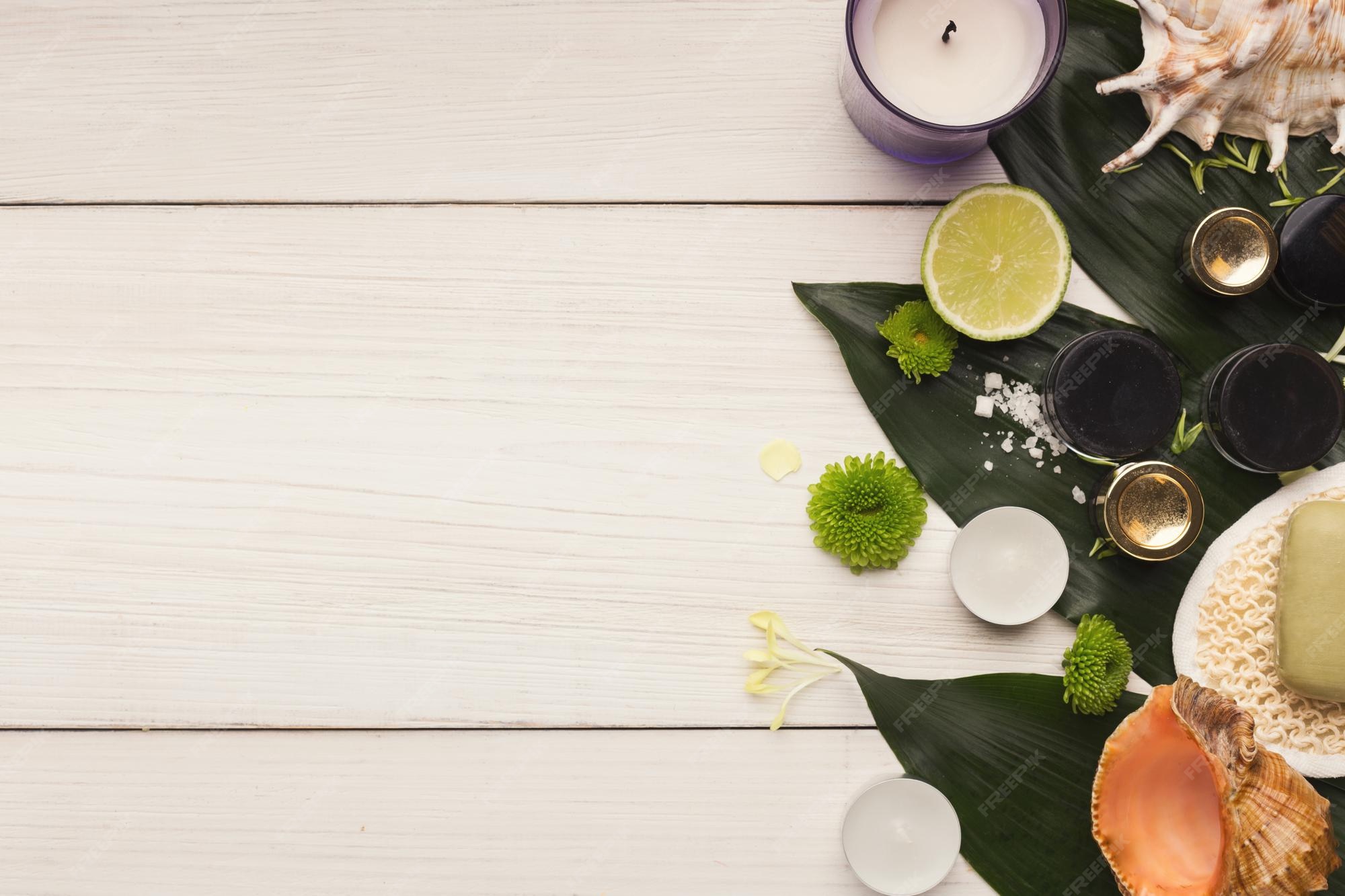 Premium Photo | Spa background. natural skincare products on big green  leaves at white table. salon or home body and skin care, copy space, top  view