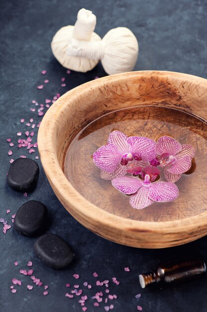 Spa background with orchids and stones zen