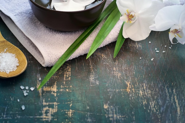 Spa background with white orchid. Space for text.