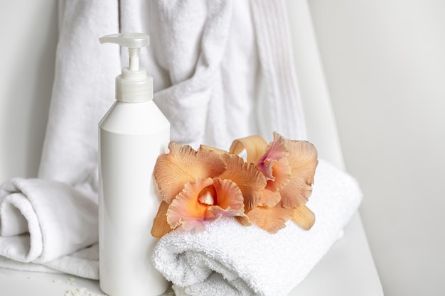 Spa composition with bath accessories and thai orchid flowers