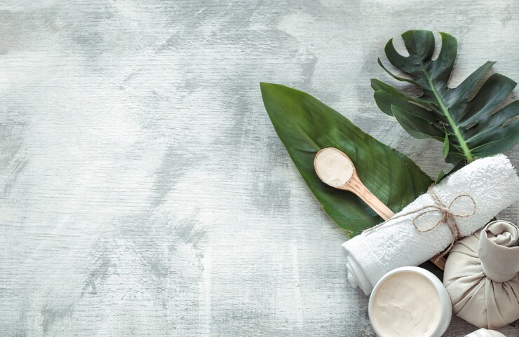 Photo spa composition with body care items on a light surface