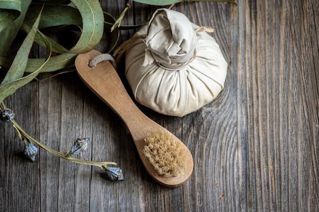 Spa composition with body care products on a wooden background