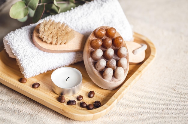 Spa composition with massage scrub soap and brush