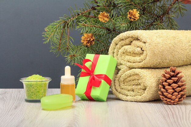 Spa composition with towel, aromatic oil, gift box, sea salt and soap