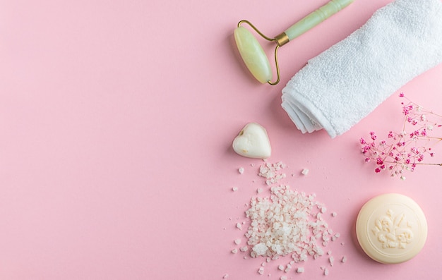 Photo spa concept flat lay on a pink background