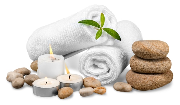 spa concept with zen basalt stones and towels