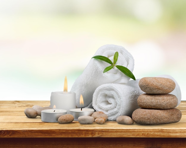 spa concept with zen basalt stones and towels