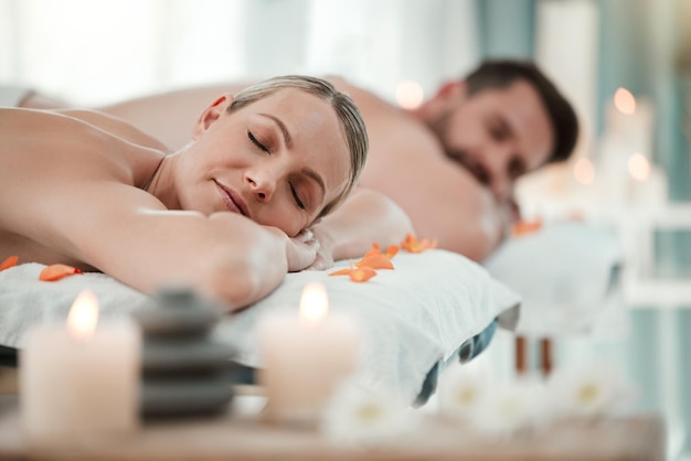 Spa couple and massage at wellness center with woman and man relax after skincare and pamper treatment Vacation luxury and beauty therapy at zen resort in Thailand with peaceful wife and husband