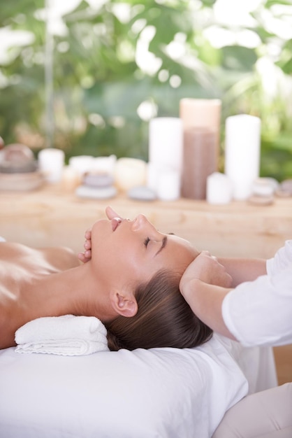 spa head and woman or hands with massage for relax luxury treatment and satisfaction with towel person face and masseuse for body care pain relief and comfort with calm wellness and skincare