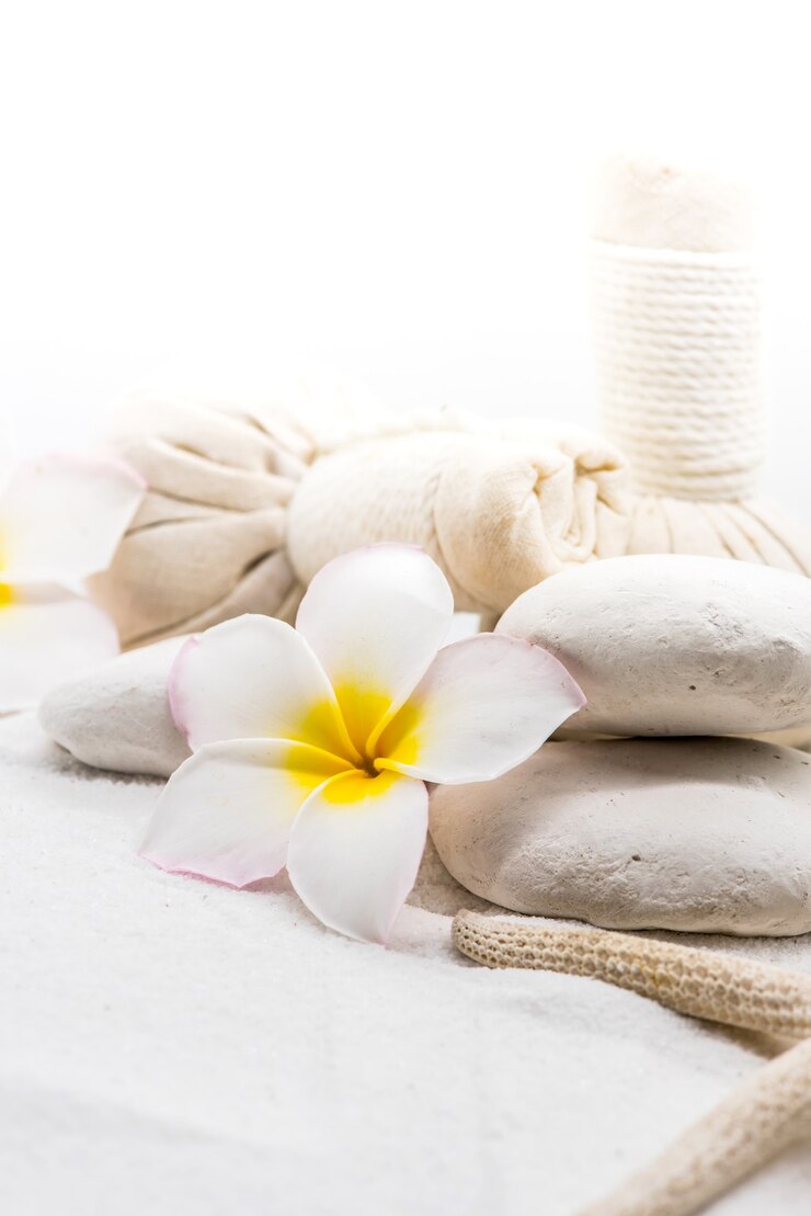 Spa and massage decoration on white sand