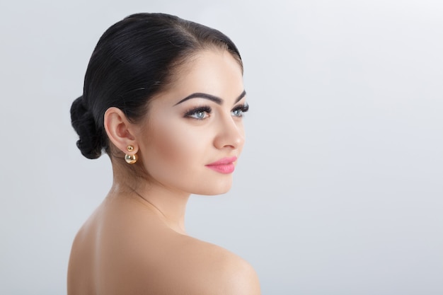 Spa portrait of attractive young brunette woman