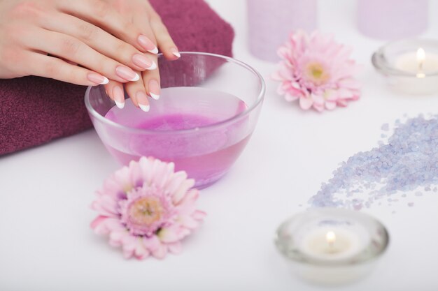 Spa Procedure, Woman In Beauty Salon Holding Fingers In Aroma Bath For Hands